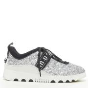 Miu Miu Pre-owned Pre-owned Läder sneakers Gray, Dam