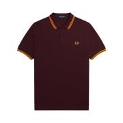 Fred Perry Slim Fit Twin Tipped Polo i Oxblood/Electric Yellow/Gold Re...