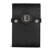 Balmain B-Buzz monogrammönstrad canvas- och läder-smartphonepåse Black...