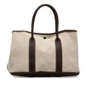 Hermès Vintage Pre-owned Canvas handvskor Beige, Dam