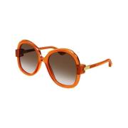 Gucci Stiliga runda solglasögon med gradientlinser Orange, Dam