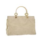 Prada Vintage Pre-owned Nylon handvskor Beige, Dam