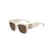 Moschino Stiliga solglasögon med elfenbensram och bruna linser Beige, ...