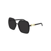 Gucci Stiliga solglasögon med Indeterminado båge Black, Dam