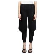 Issey Miyake Svarta Tapered Veckade Botten Byxor Black, Dam