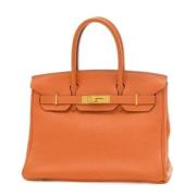 Hermès Vintage Pre-owned Laeder handvskor Orange, Dam