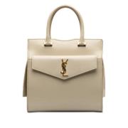 Yves Saint Laurent Vintage Pre-owned Laeder handvskor Beige, Dam