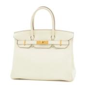 Hermès Vintage Pre-owned Tyg handvskor Beige, Dam