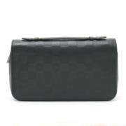 Louis Vuitton Vintage Pre-owned Tyg kuvertvskor Black, Dam