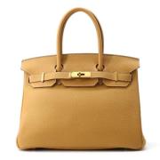 Hermès Vintage Pre-owned Laeder handvskor Yellow, Dam