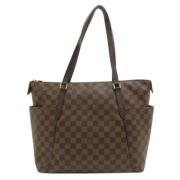 Louis Vuitton Vintage Pre-owned Tyg axelremsvskor Brown, Dam