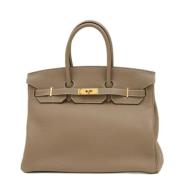 Hermès Vintage Pre-owned Laeder handvskor Beige, Dam