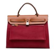 Hermès Vintage Pre-owned Canvas handvskor Red, Dam