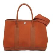 Hermès Vintage Pre-owned Canvas handvskor Orange, Dam