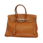 Hermès Vintage Pre-owned Laeder handvskor Brown, Dam