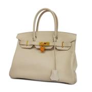 Hermès Vintage Pre-owned Laeder handvskor Beige, Dam