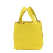 Hermès Vintage Pre-owned Laeder handvskor Yellow, Dam