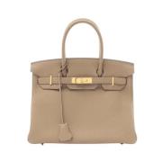 Hermès Vintage Pre-owned Laeder handvskor Beige, Dam