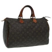 Louis Vuitton Vintage Pre-owned Canvas handvskor Brown, Dam