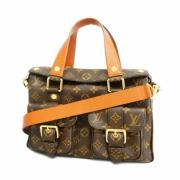 Louis Vuitton Vintage Pre-owned Tyg louis-vuitton-vskor Brown, Dam