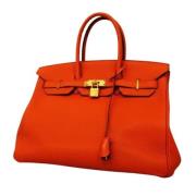 Hermès Vintage Pre-owned Laeder handvskor Orange, Dam