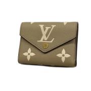 Louis Vuitton Vintage Pre-owned Tyg plnbcker Beige, Dam