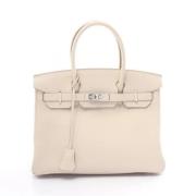 Hermès Vintage Pre-owned Laeder handvskor Beige, Dam