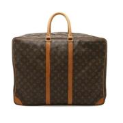 Louis Vuitton Vintage Pre-owned Tyg resvskor Brown, Dam