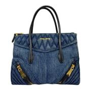 Miu Miu Pre-owned Pre-owned Denim handvskor Blue, Dam