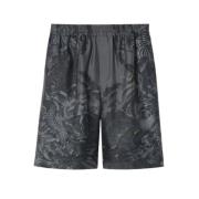 Gucci Silkes shorts med flora och fauna tryck Gray, Herr