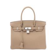 Hermès Vintage Pre-owned Laeder handvskor Beige, Dam