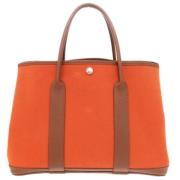 Hermès Vintage Pre-owned Canvas handvskor Orange, Dam