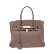 Hermès Vintage Pre-owned Laeder handvskor Brown, Dam