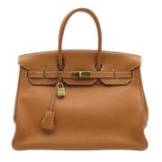 Hermès Vintage Pre-owned Laeder handvskor Brown, Dam