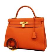 Hermès Vintage Pre-owned Laeder handvskor Orange, Dam