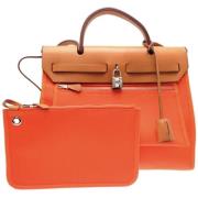 Hermès Vintage Pre-owned Laeder handvskor Orange, Dam