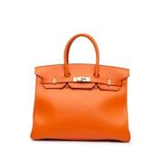 Hermès Vintage Pre-owned Laeder handvskor Orange, Dam