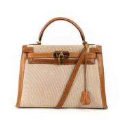 Hermès Vintage Pre-owned Canvas handvskor Beige, Dam