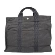 Hermès Vintage Pre-owned Canvas handvskor Gray, Dam