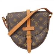 Louis Vuitton Vintage Pre-owned Tyg kuvertvskor Brown, Dam