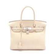 Hermès Vintage Pre-owned Laeder handvskor Beige, Dam