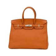 Hermès Vintage Pre-owned Laeder handvskor Orange, Dam