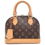 Louis Vuitton Vintage Pre-owned Canvas handvskor Brown, Dam