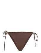 The Athena Bottom Brown AYA Label